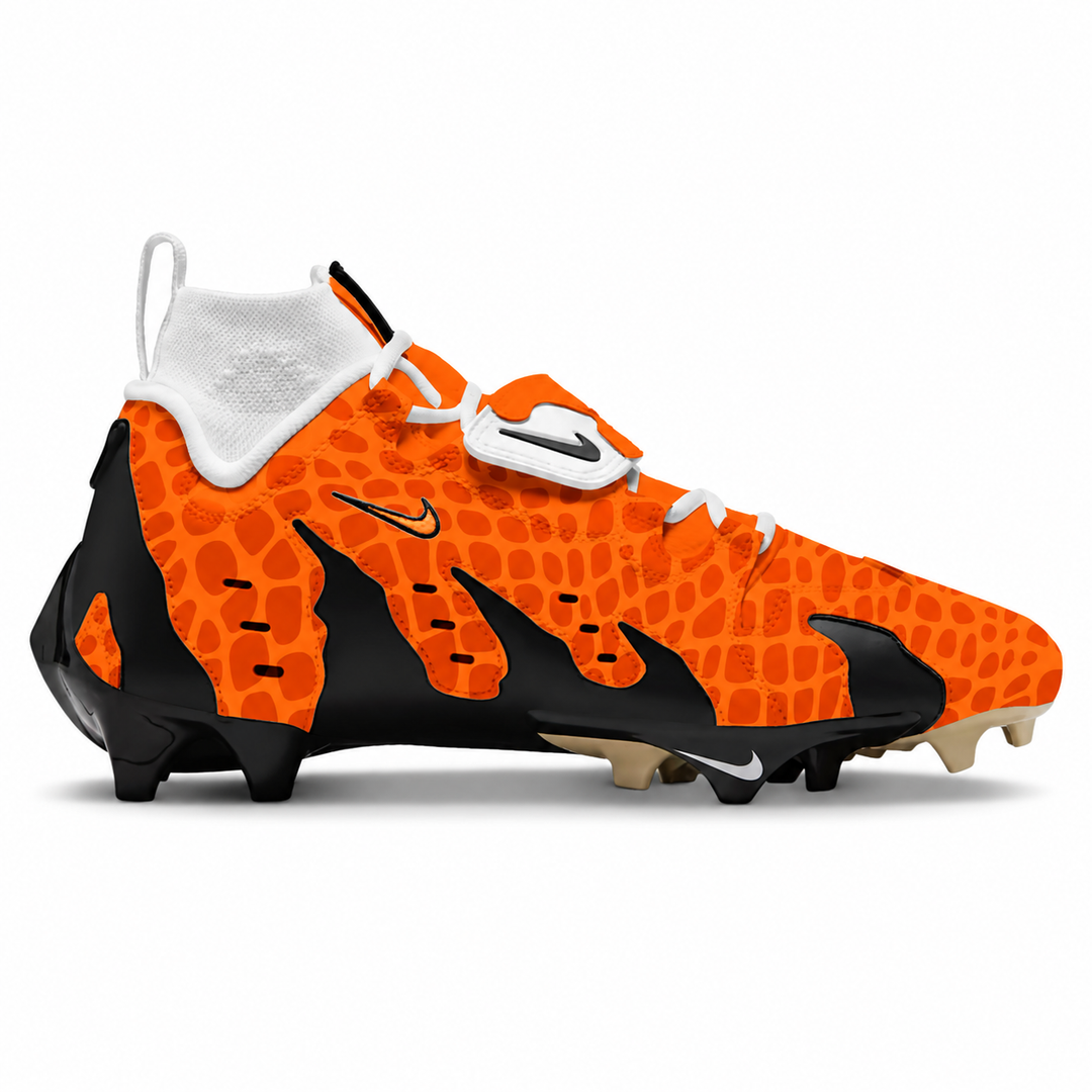 A Nike high-top football cleat in vibrant orange and black with a textured pattern, white laces, a white ankle collar, and a black Nike swoosh on the side.