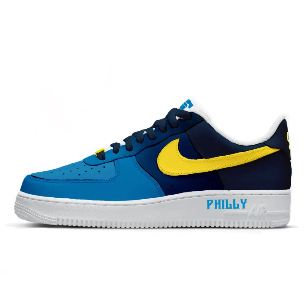 Blue and yellow sneaker with 'PHILLY' text on a white background