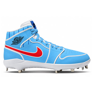 A light blue high-top baseball cleat featuring a red Nike Swoosh, white stitching, a white midsole with metal cleats, and a black Jordan Wings logo on the side.