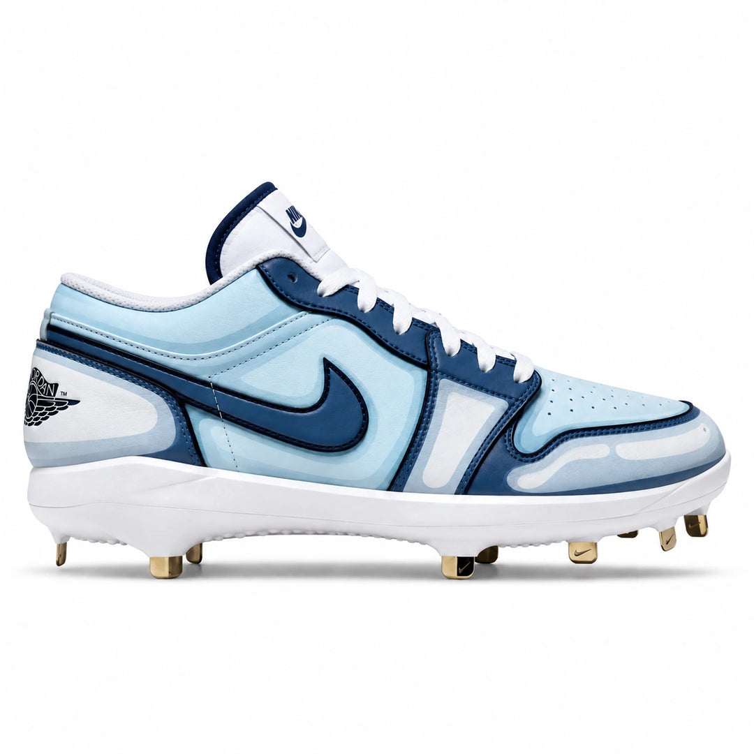 A Nike Air Jordan 1 Retro High OG baseball cleat in light blue, navy, and white, featuring gold metal studs on a white background.