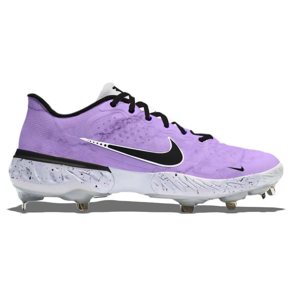 Purple and black cleated shoe with Nike logo on a white background