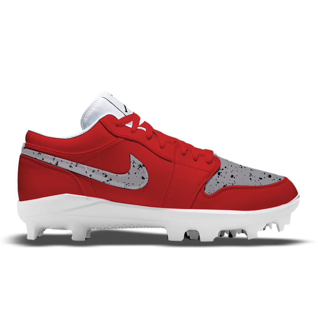 Red and gray cleated shoe on a white background