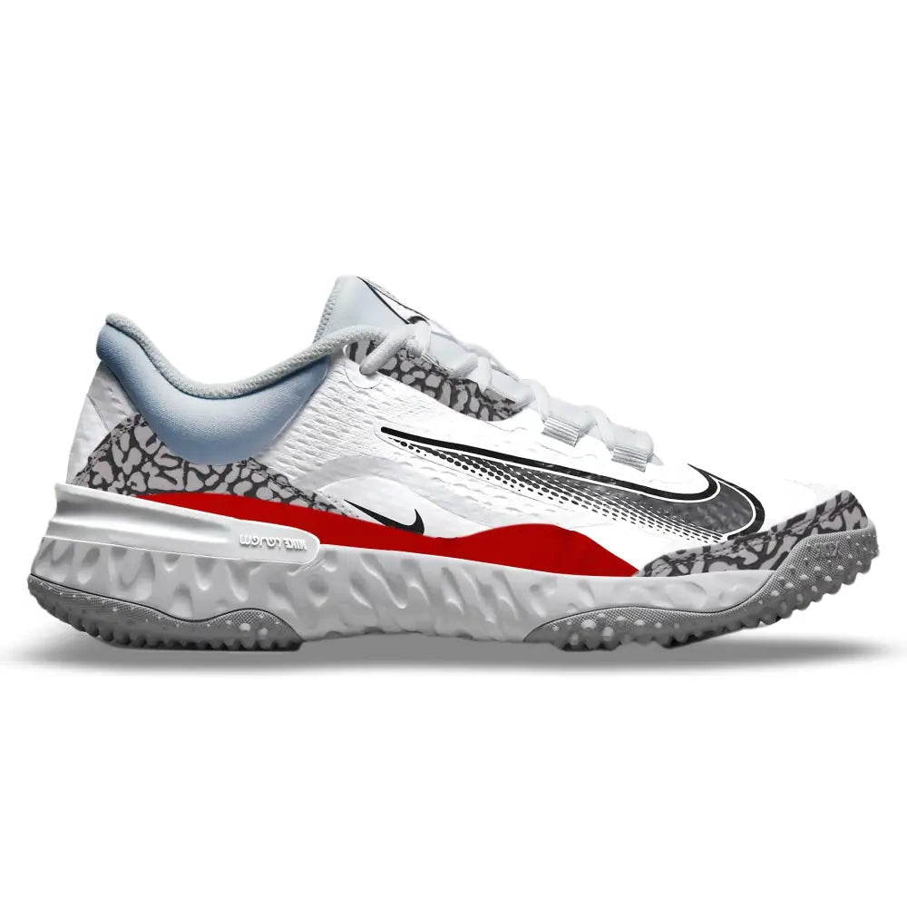 White baseball turf shoe with red and black accents on a white background