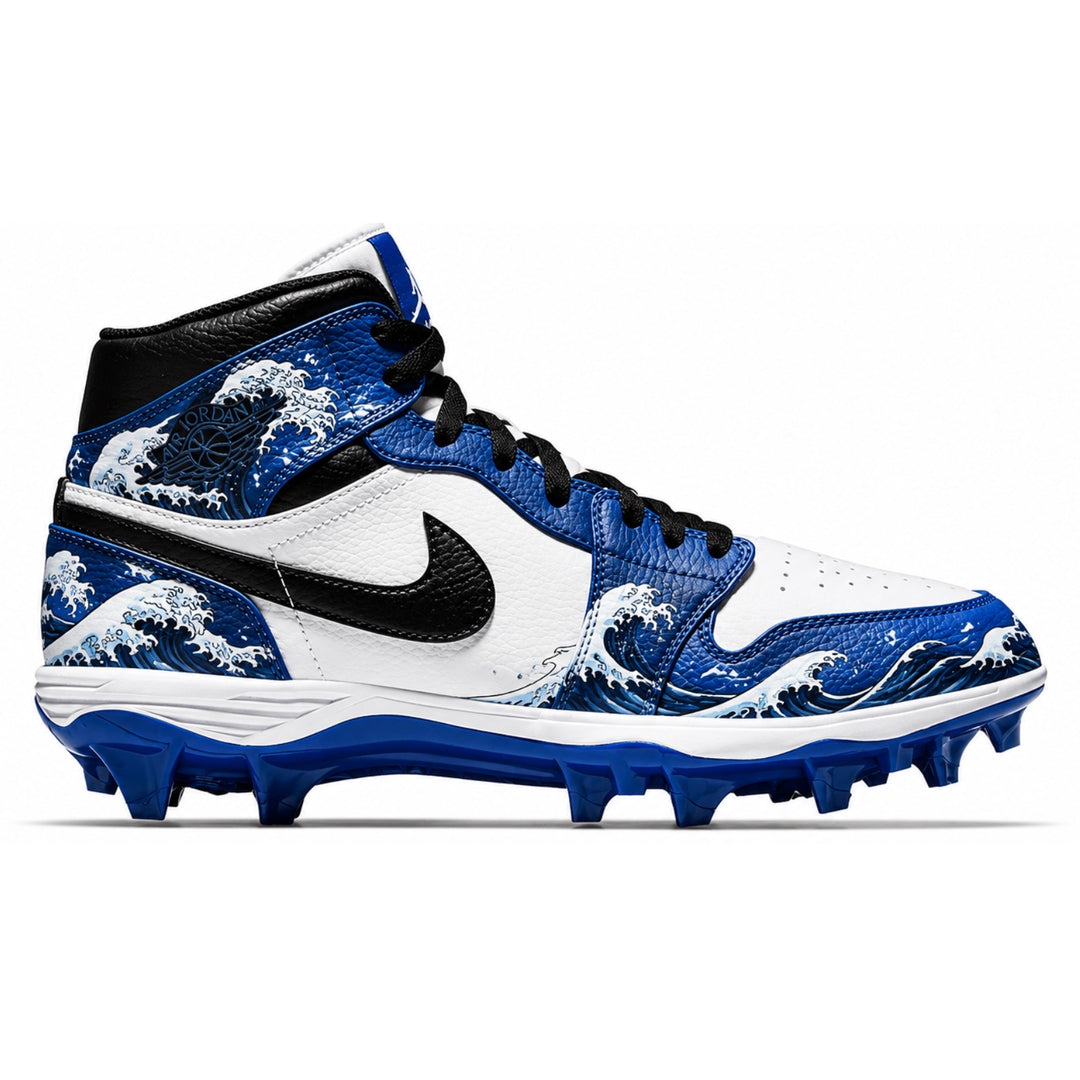 Custom royal blue and white Jordan 1 Mid TD football cleats featuring a bold wave-art design with a matching blue sole — by Stadium Custom Kicks