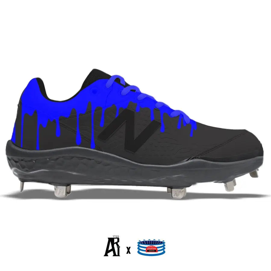 Black New Balance 3000v5 baseball cleat with blue paint drips for a stylish look