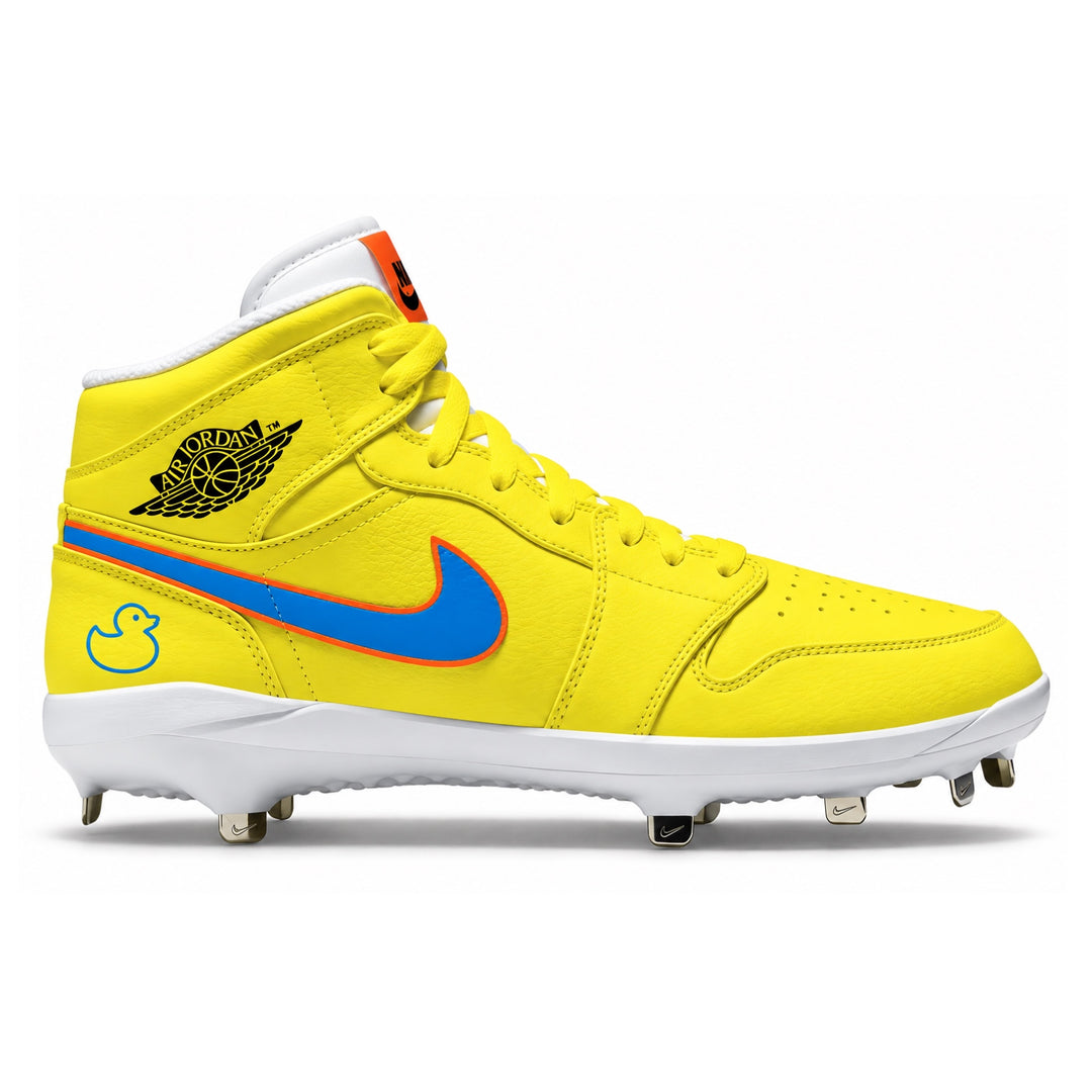 A high-top Nike baseball cleat in bright yellow, featuring a blue and orange Nike swoosh, a black Air Jordan wing logo, a light blue rubber duck graphic on the heel, and white laces and midsole.