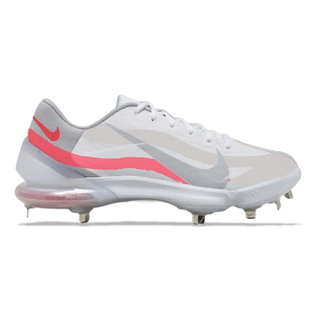 White and pink cleated shoe on a white background