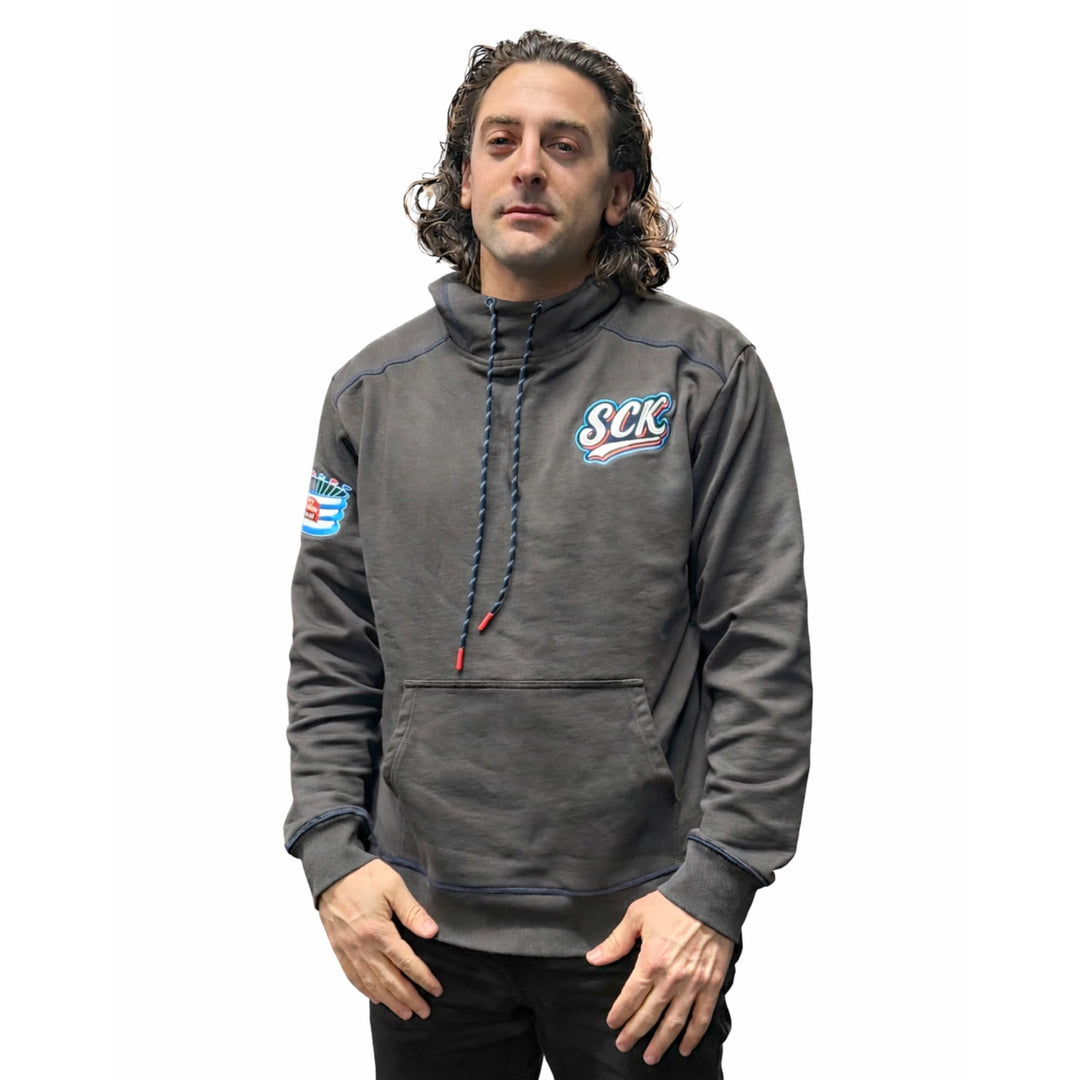 Man wearing a gray hoodie with logos on a white background