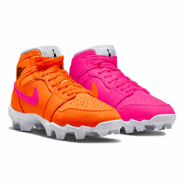 Custom colorway featuring a bright orange upper with hot pink Swoosh on the left cleat and a hot pink upper on the right cleat, both with white molded cleat soles by Stadium Custom Kicks