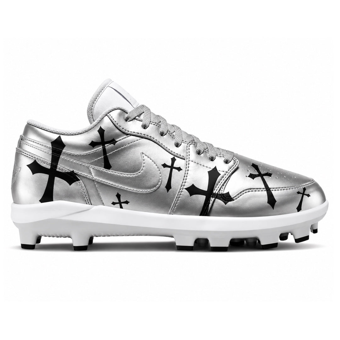 Custom silver Jordan 1 Retro MCS cleats featuring a bold black cross pattern and white sole for a sleek, edgy look — by Stadium Custom Kicks.

