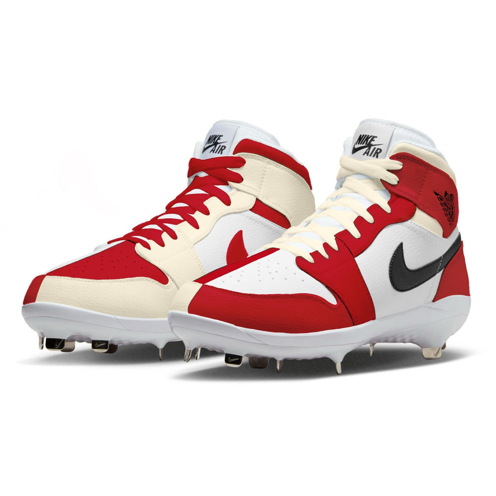 Red and white Nike Air cleats on a white background