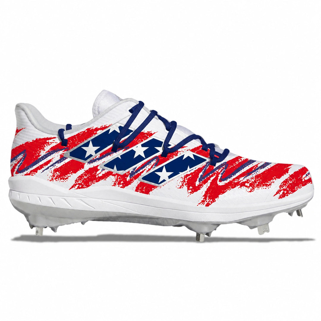 A white baseball cleat featuring a red and navy blue flag-inspired graphic pattern with white stars, set against a plain white background.