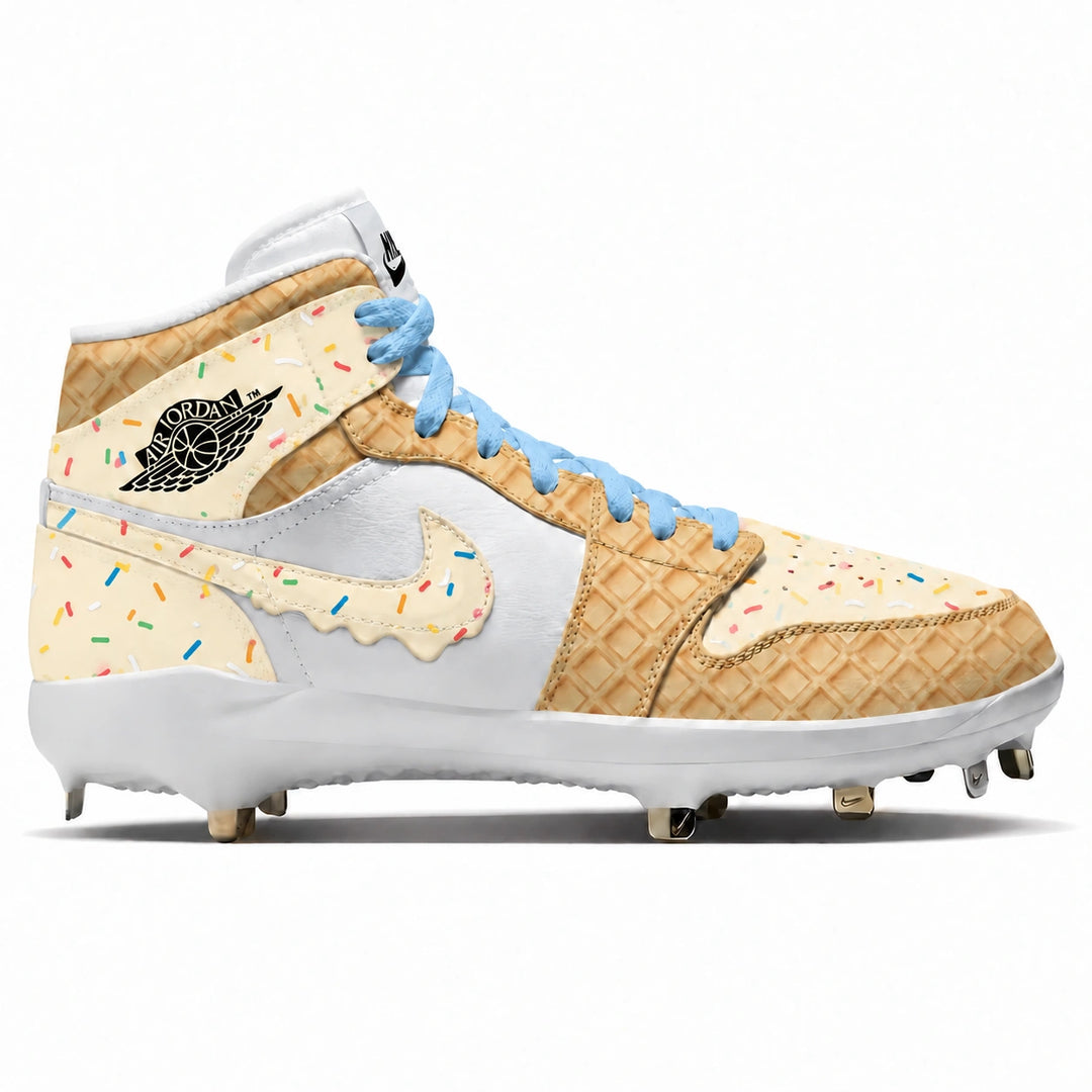 A high-top Nike x Air Jordan baseball cleat featuring a waffle-print and ice cream-drip design in beige and white, with light blue laces and multicolor sprinkle details.