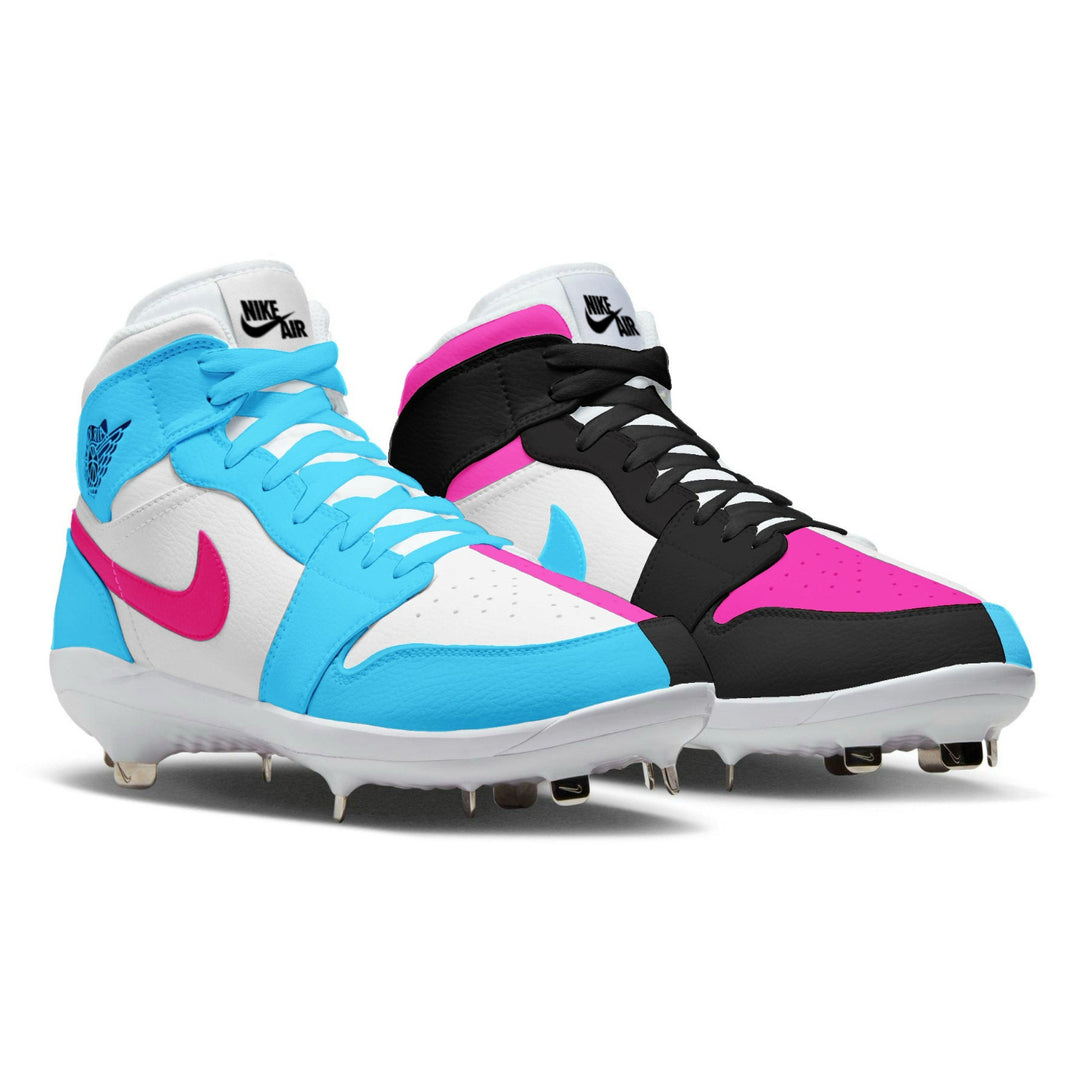 Colorful Nike cleats with blue, pink, and black design on a white background