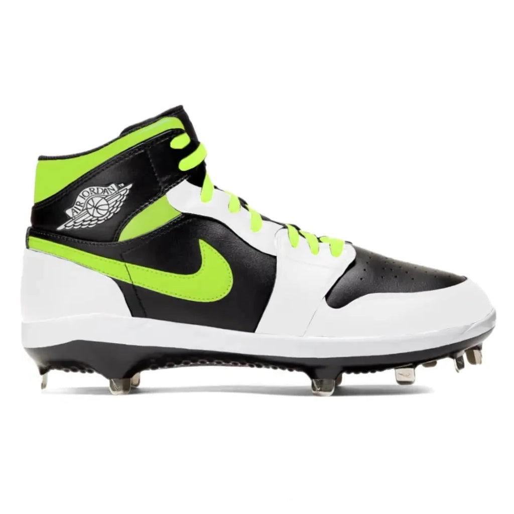 Volt, black and white mid top baseball cleat on a white background.